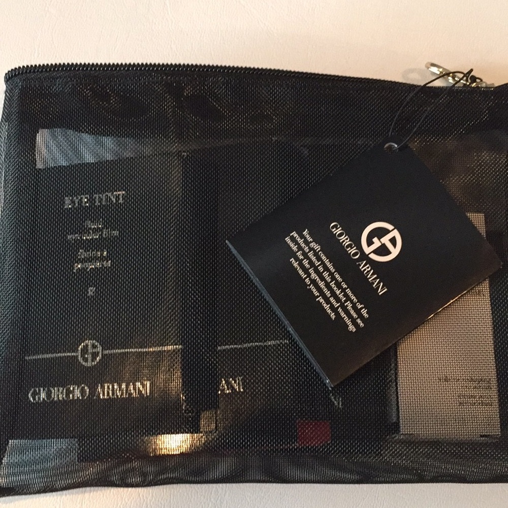 Brand New Giorgio Armani Essentials in a bag